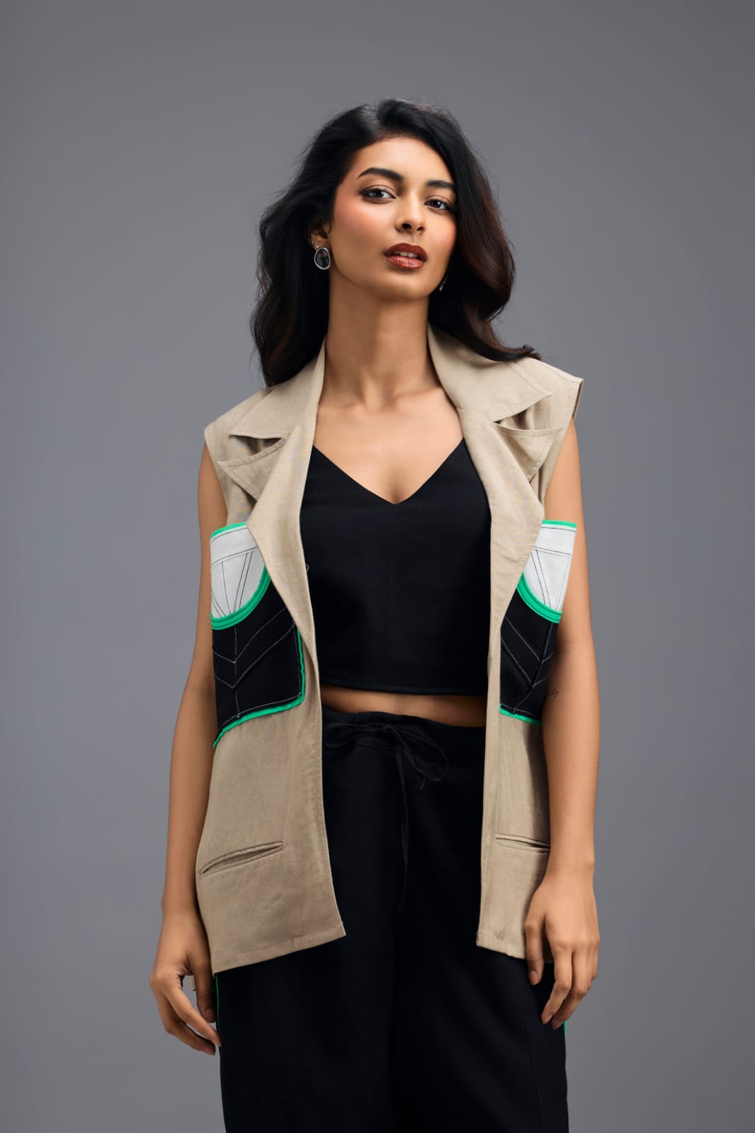 BEIGE CO-ORD SET WITH NEON GEOMETRIC PANELLED SLEEVELESS BLAZER, TWISTED TOP AND STRIPE PANTS