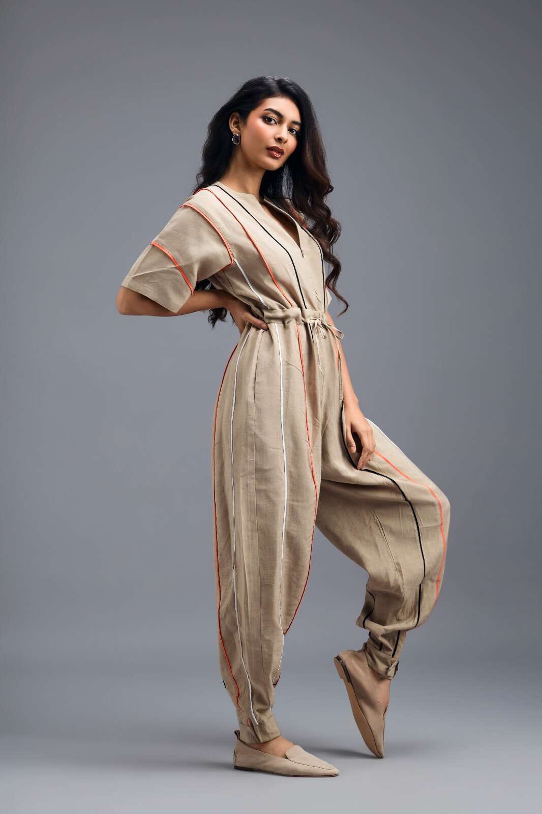 BEIGE ZIP-FRONT JUMPSUIT WITH NEON CONTRAST PIPING
