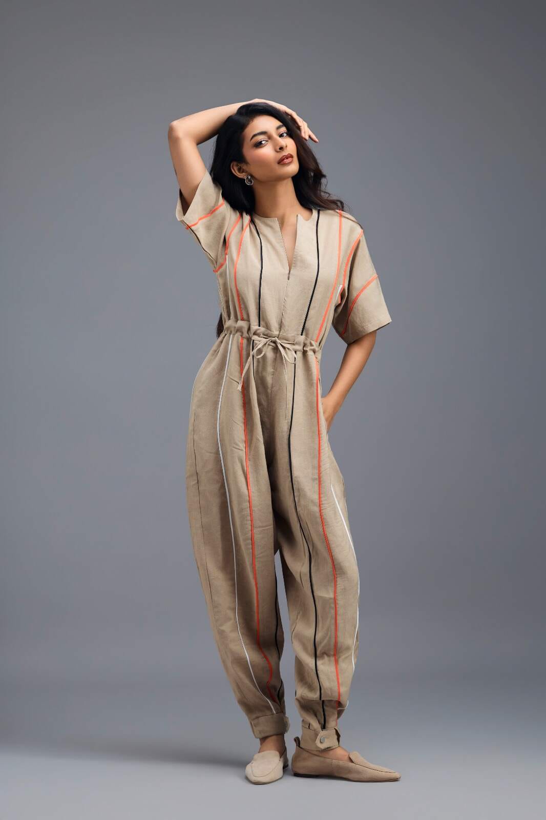 BEIGE ZIP-FRONT JUMPSUIT WITH NEON CONTRAST PIPING