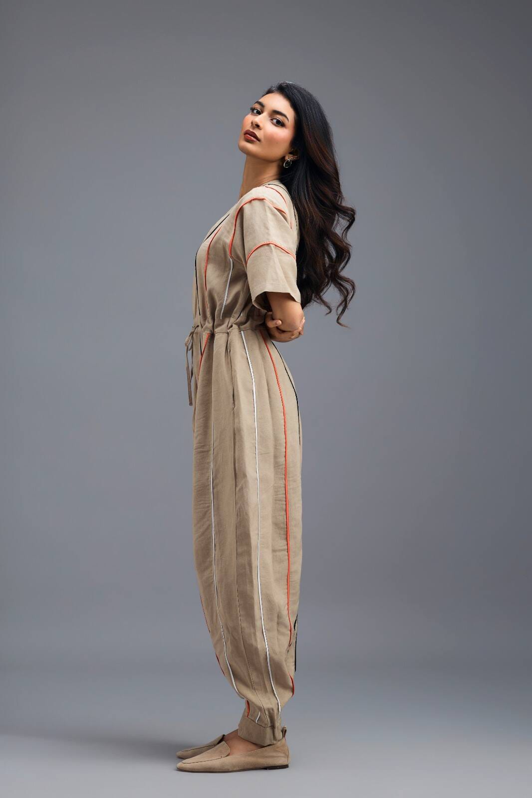 BEIGE ZIP-FRONT JUMPSUIT WITH NEON CONTRAST PIPING