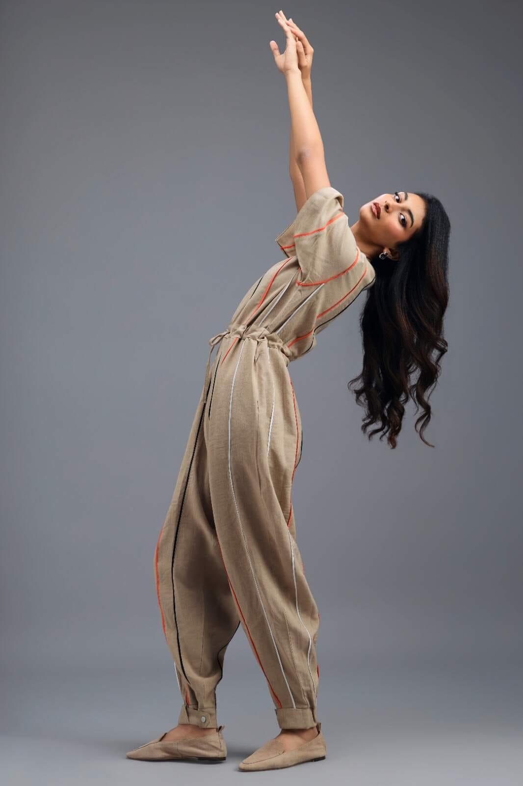 BEIGE ZIP-FRONT JUMPSUIT WITH NEON CONTRAST PIPING