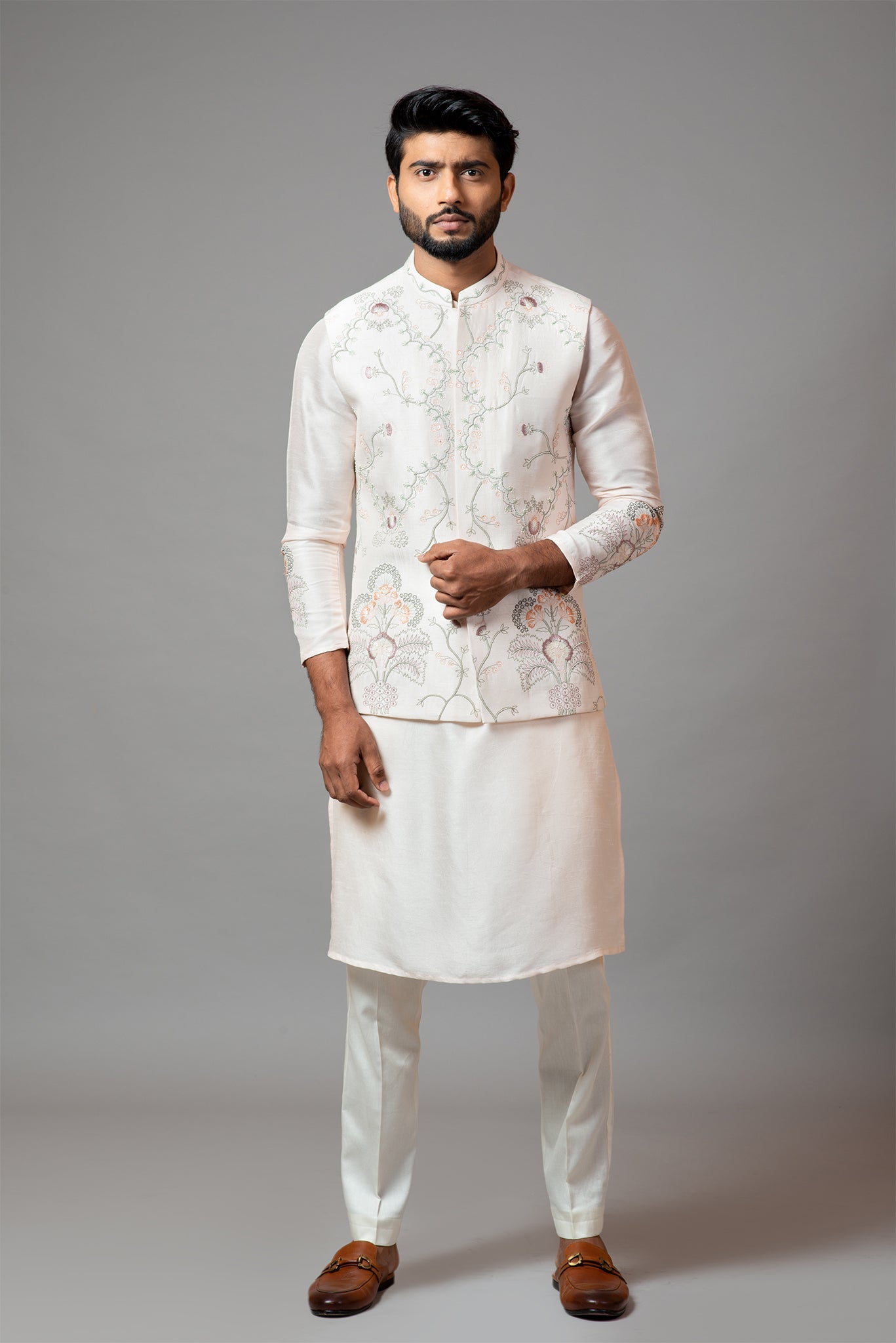 Baby Pink Nehru Jacket with Multi Colour Garden Themed Embroidery.