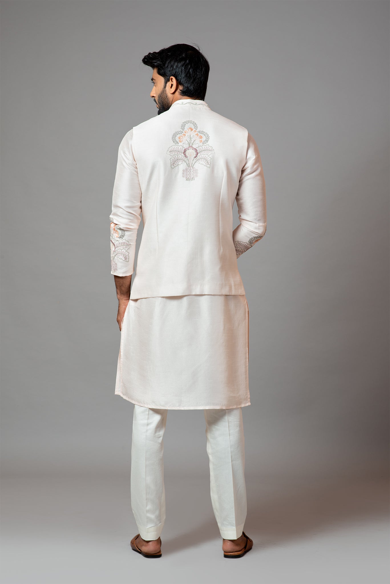 Baby Pink Nehru Jacket with Multi Colour Garden Themed Embroidery.