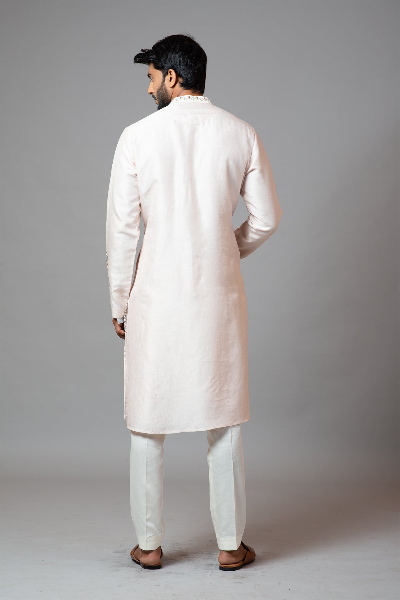 Baby pink Nehru jacket with Multi colour garden themed embroidery paired with tonal kurta and pant pajama Set