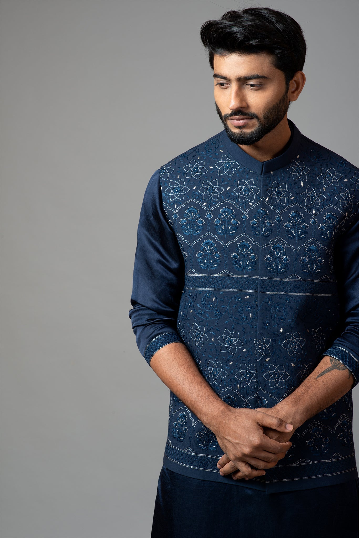 Navy Blue Kora Nehru  jacket with Mughal inspired embroidery paired with a drape kurta  set