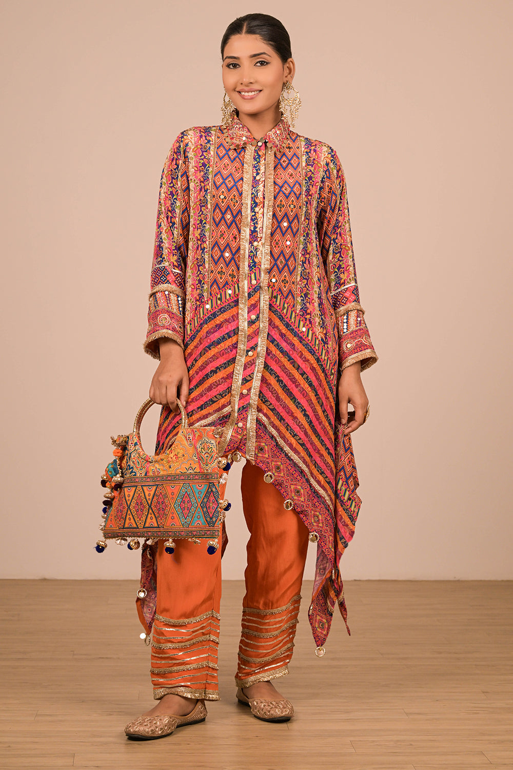 Asymmetrical Orange Kurta Set In Creope with Canvas Tote Bag