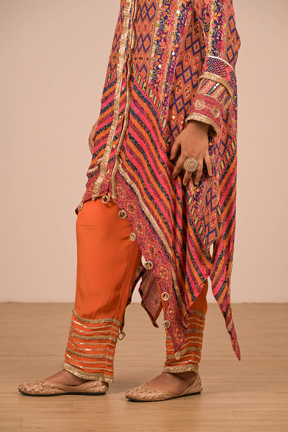 Asymmetrical Orange Kurta Set In Creope with Canvas Tote Bag