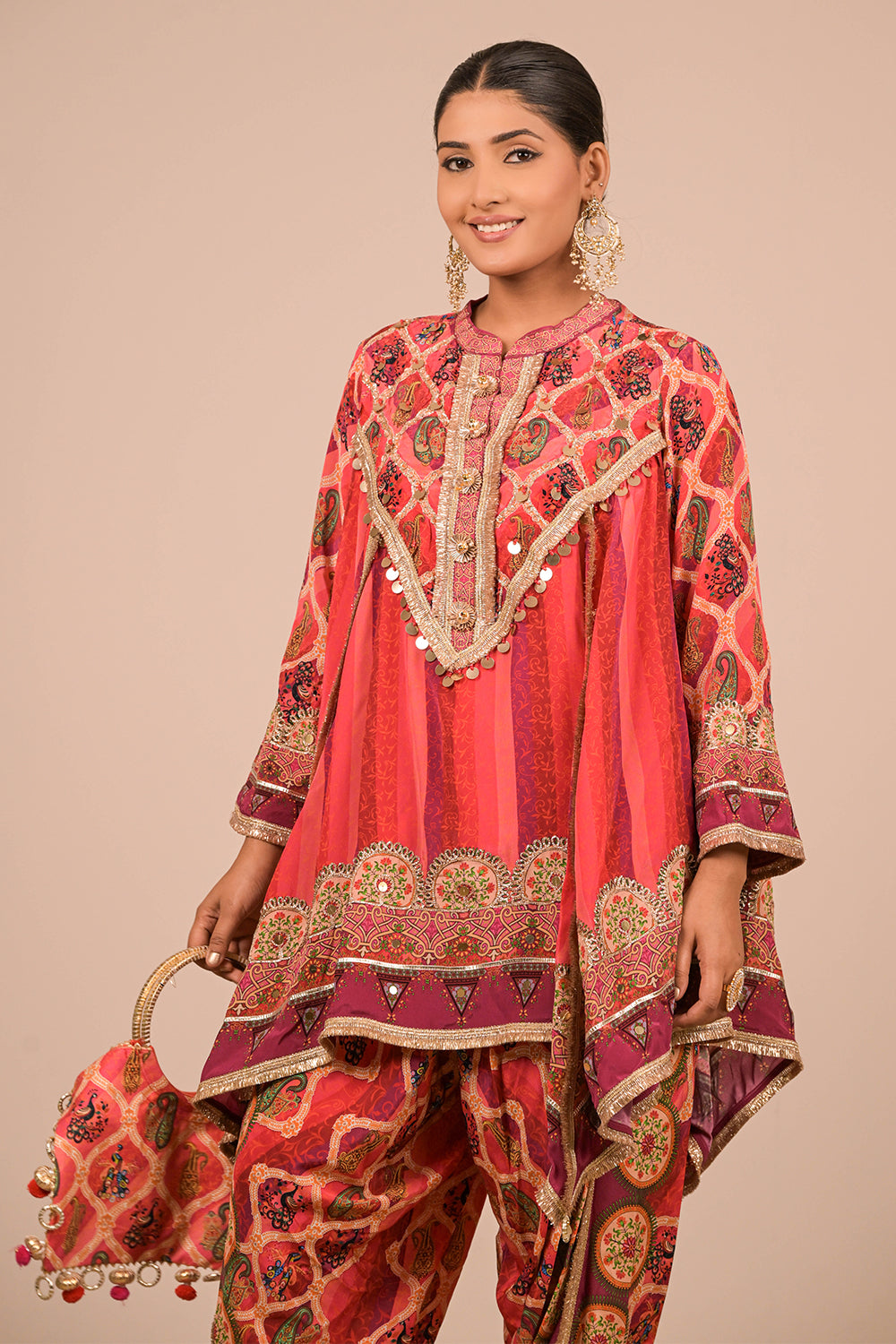 Vibrant Persian Red Crepe Suit Set with Tulip Pants and Heavy Embroidered Potli Bag