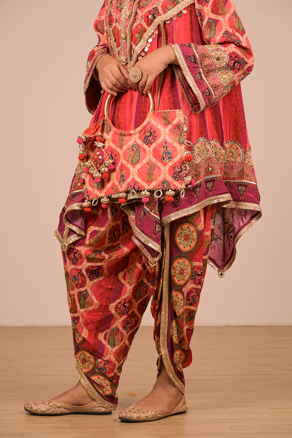 Persian Red Crepe Suit Set with Tulip Pants & Embroidered Potli