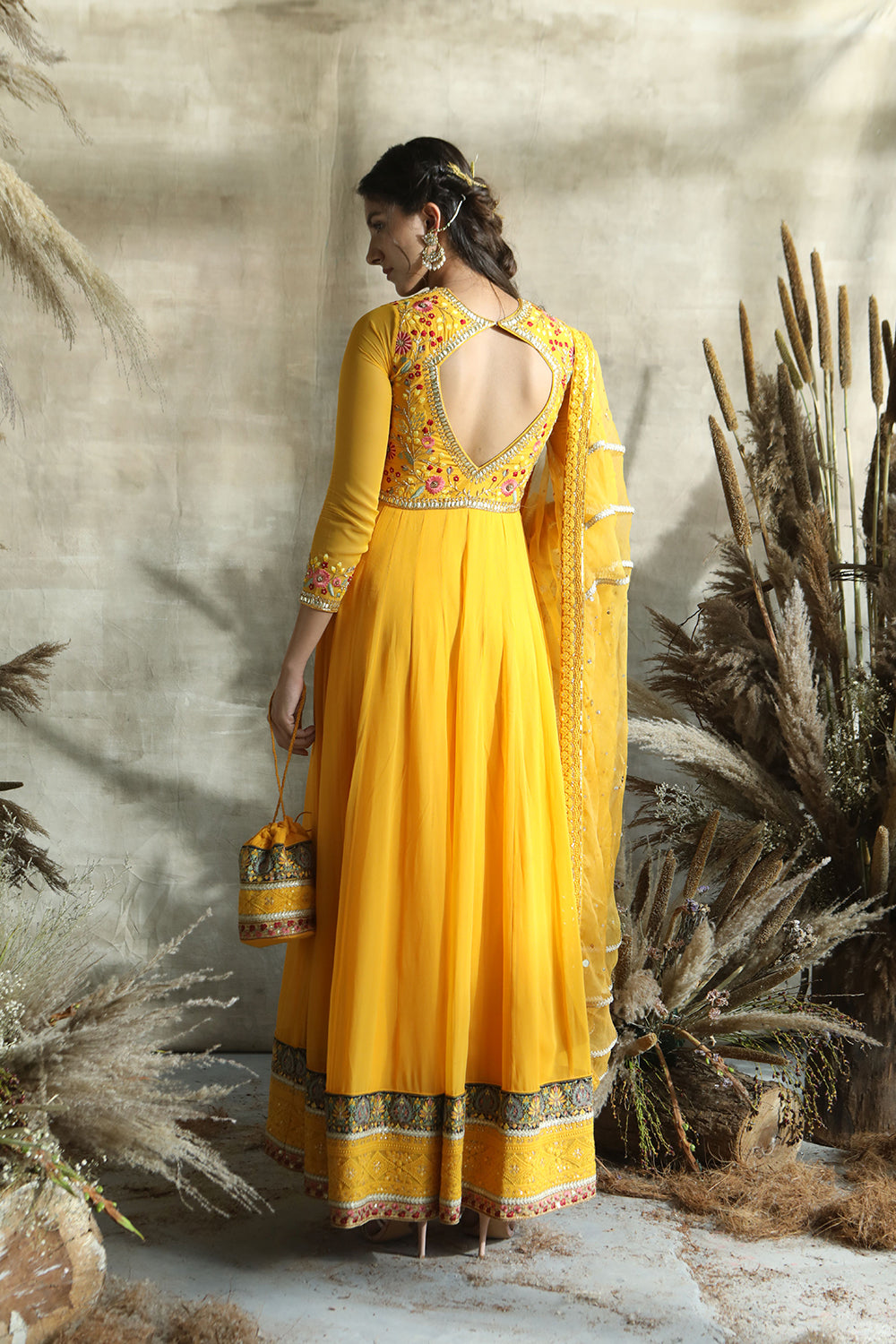 Yellow Anarkali Suit With Multicolored Thread Work,Potli And Dupatta